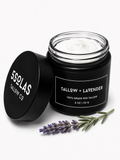 Open jar of 5Solas Tallow Co. grass‑fed tallow skin balm in the lavender blend, shown with natural ingredients around the container.