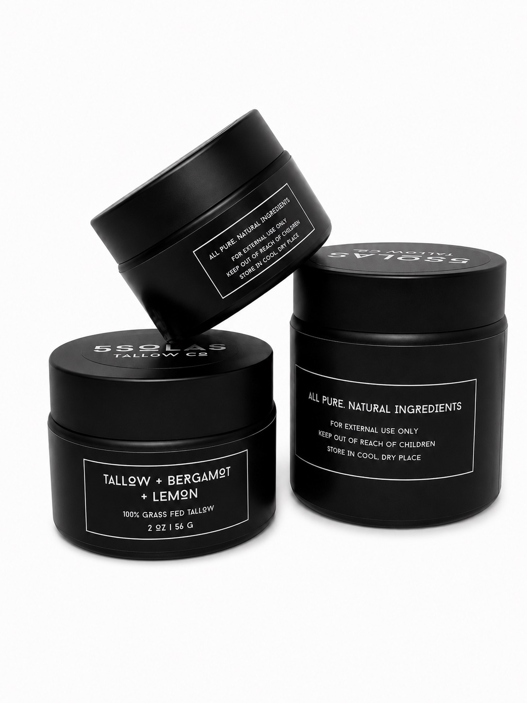 This image features three 5SOLAS Tallow Co containers—4 oz, 2 oz, and 1 oz—in the TALLOW + BERGAMOT + LEMON scent, with two jars placed side‑by‑side and the third positioned on top for a clean, elevated display.